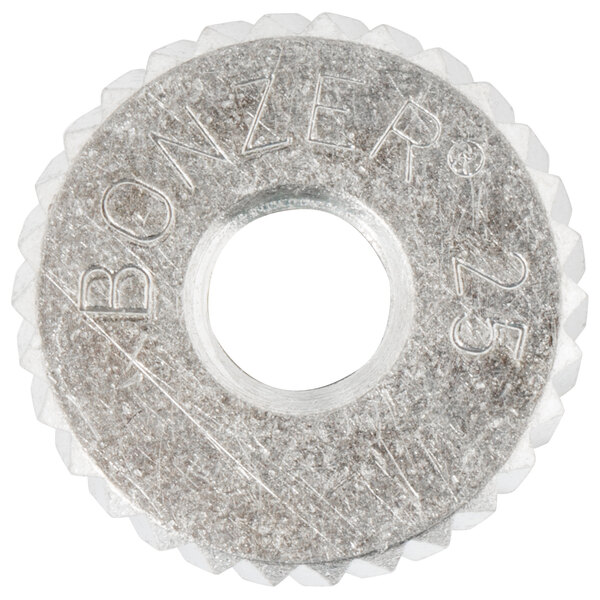 A circular metal Vollrath BCO-12 gear with a hole in the middle.