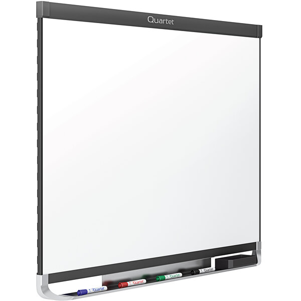 A Quartet magnetic porcelain white board with a black graphite frame.
