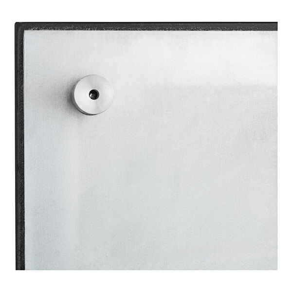 A black glass Quartet markerboard with metal hardware.