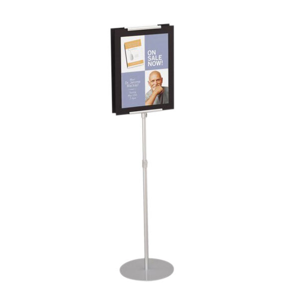 A silver Quartet pedestal stand with an 8 1/2" x 11" sign insert on it.