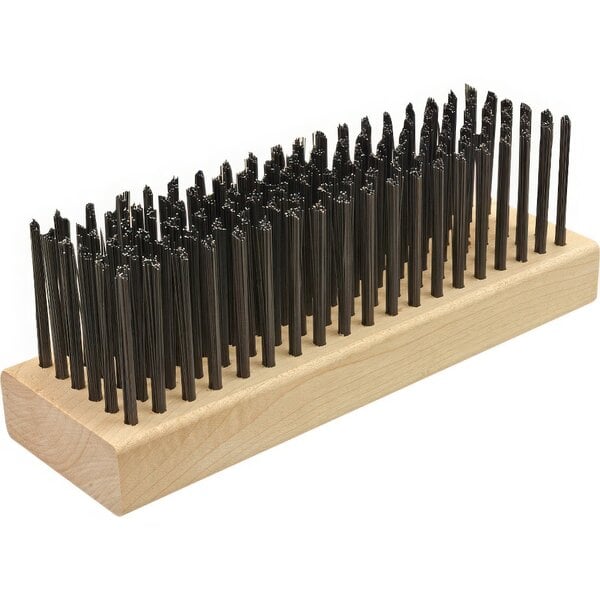 A Texas Grill Brush with a wooden handle and black metal bristles.