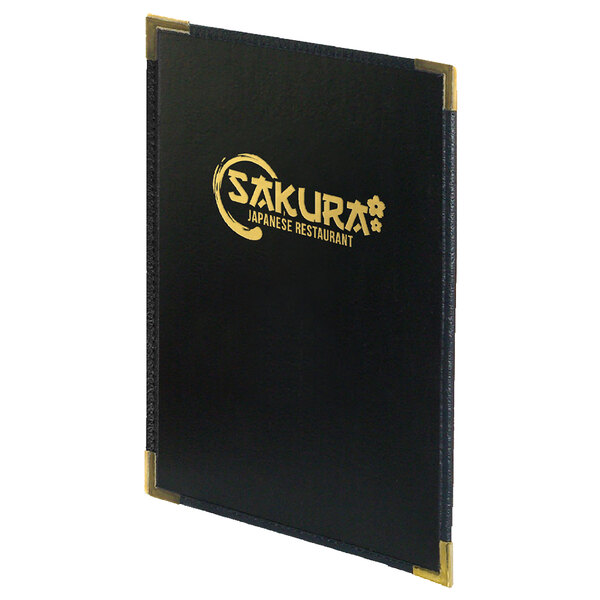 A black menu cover with gold writing.