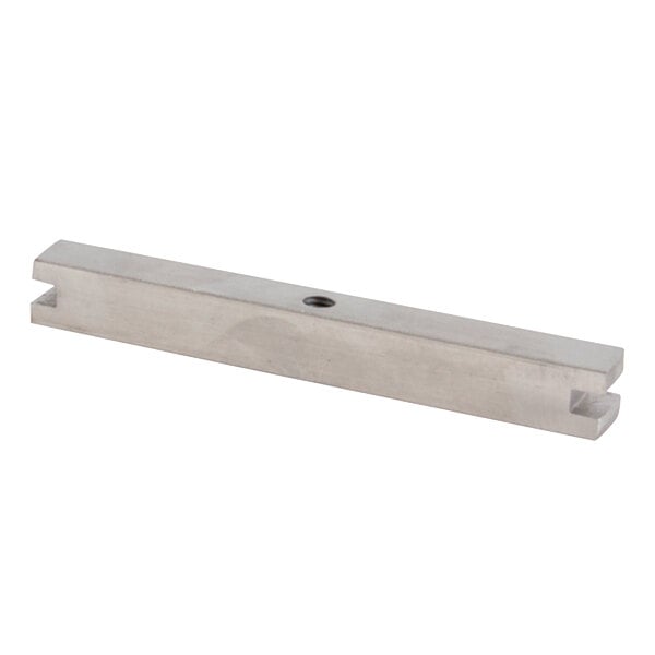 A metal bracket with a hole in the middle.