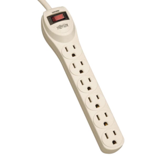 A close-up of a gray Tripp Lite industrial power strip with a red light.