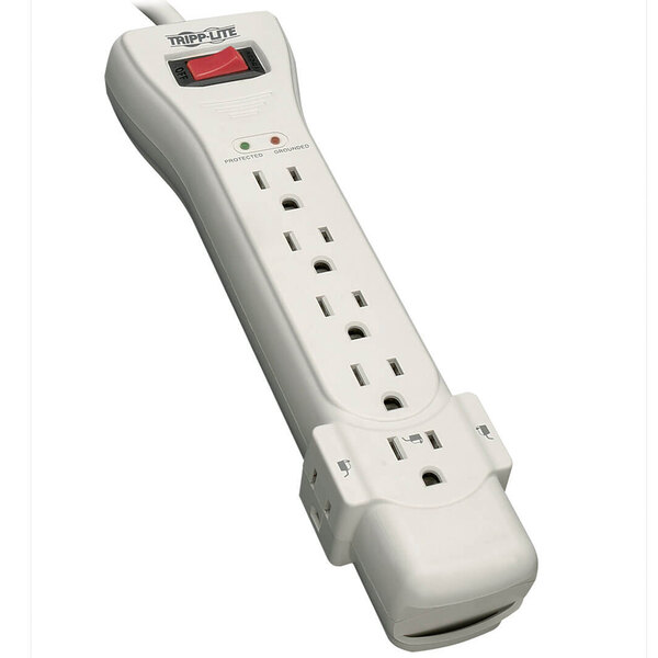 A light gray Tripp Lite surge protector with red lights on it.