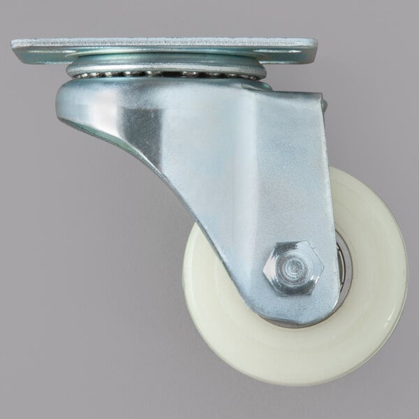 A metal plate caster with a white wheel.