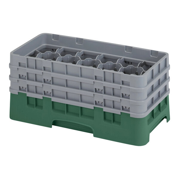 A grey and green plastic Cambro glass rack tray with 17 compartments.