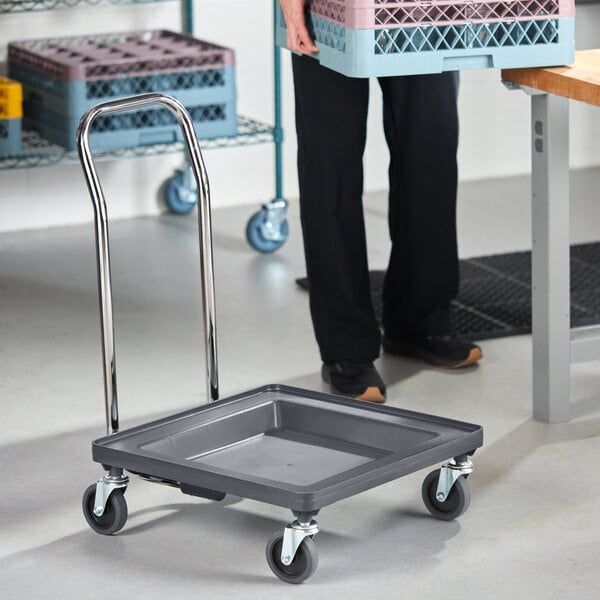 A gray dish rack and glass rack dolly with a 31-inch chrome handle and four swivel casters.