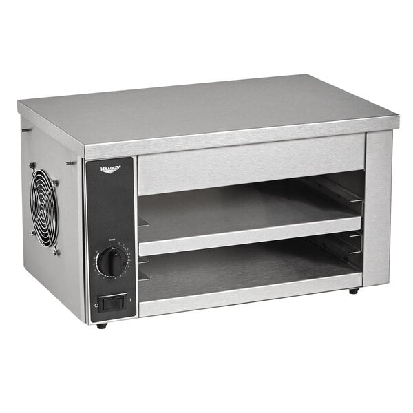 A silver rectangular Vollrath countertop cheese melter with two shelves.