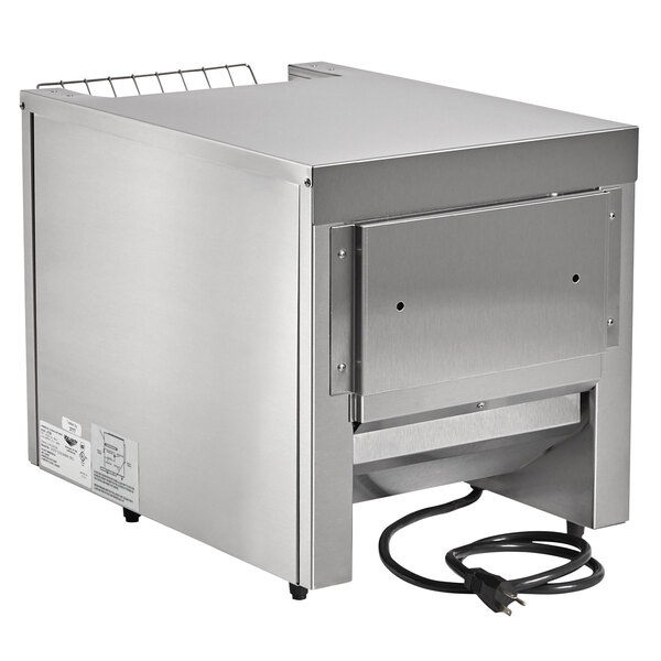 A Vollrath JT2B conveyor toaster on a school kitchen counter.