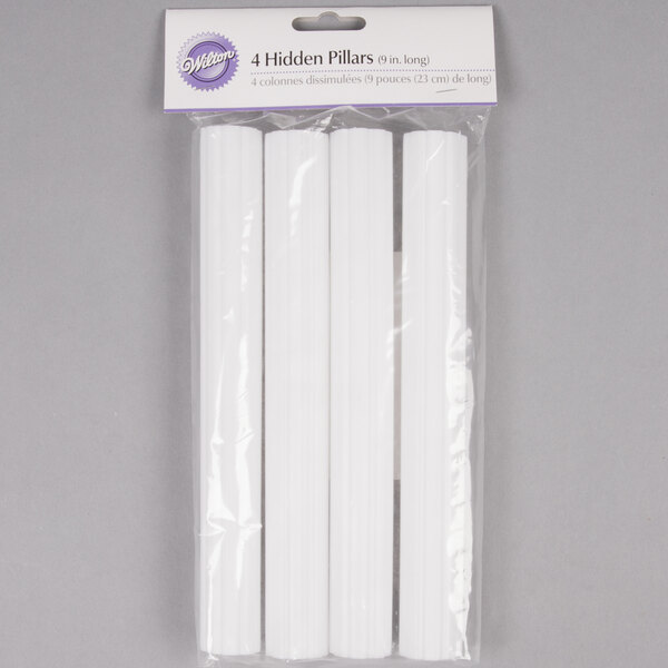A pack of white Wilton plastic hidden cake pillars.