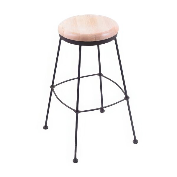 A Holland Bar Stool black wrinkle steel counter height stool with natural maple wood seat.