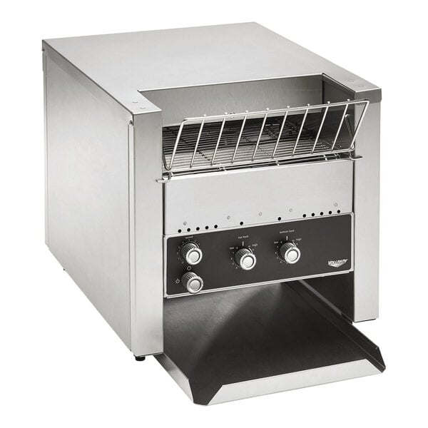 A Vollrath conveyor toaster on a counter.