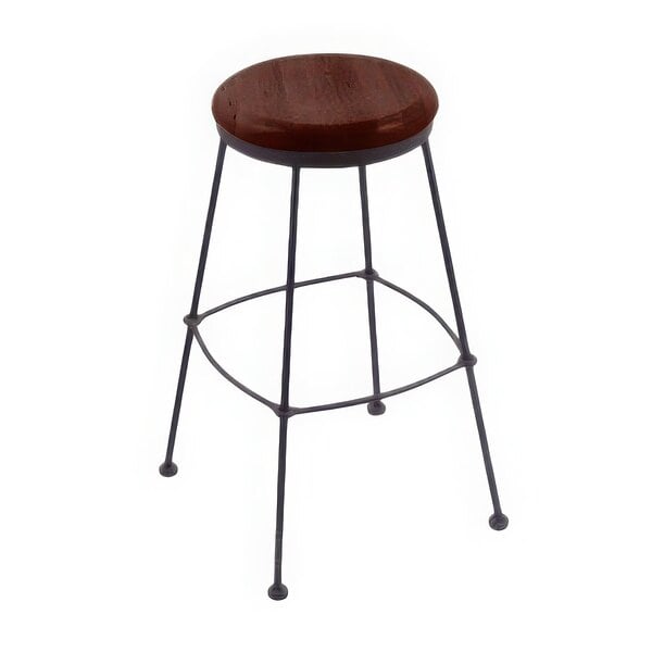 A Holland Bar Stool with a dark cherry oak wood seat and black wrinkle steel legs.