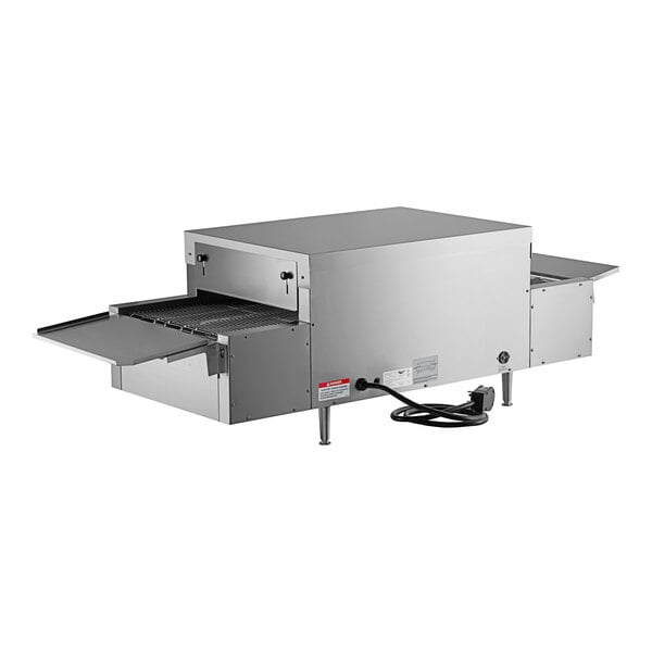 A Vollrath countertop conveyor oven with two open doors.