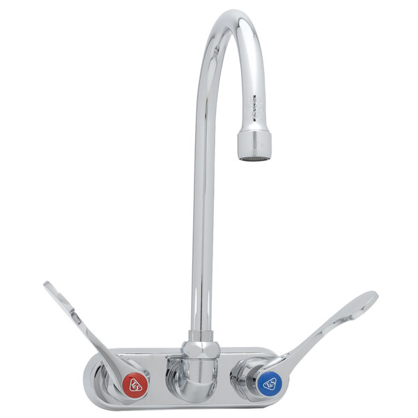 A T&S chrome wall mount faucet with wrist handles for hot and cold water.