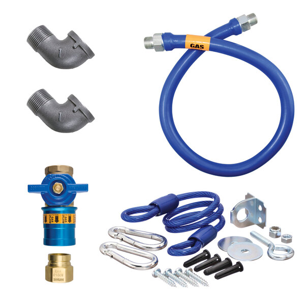 A blue Dormont gas connector hose kit with parts.