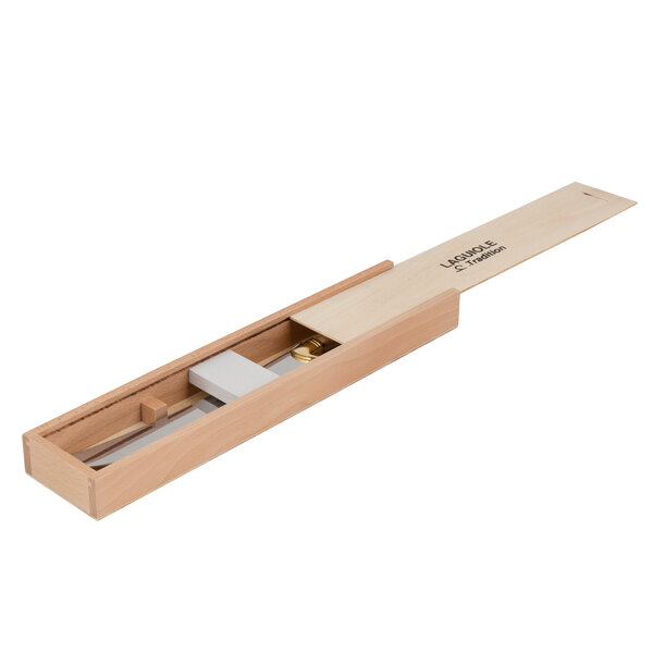 A wooden box with a Laguiole champagne saber inside.