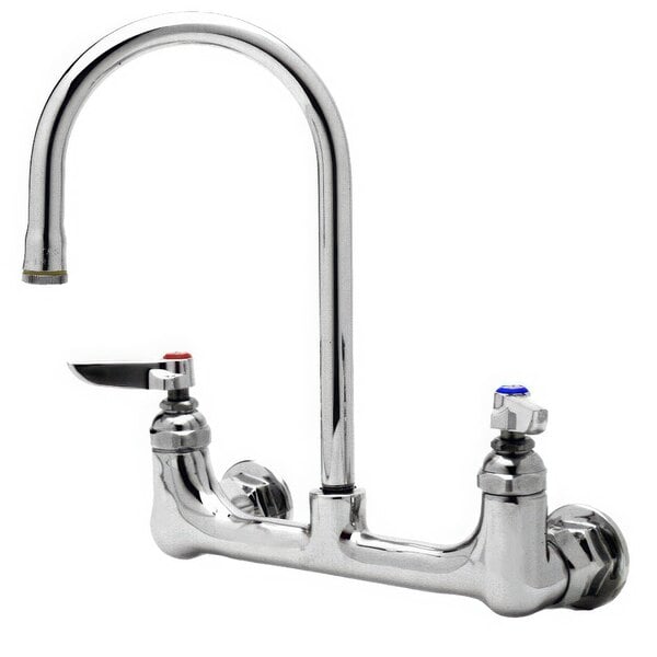 A close-up of a silver T&S wall mount pantry faucet with two lever handles.