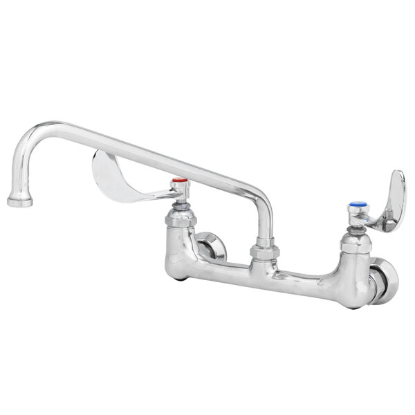 A chrome T&S wall mounted pantry faucet with wrist handles and a swing spout.