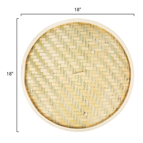 A close up of a round bamboo steamer cover.