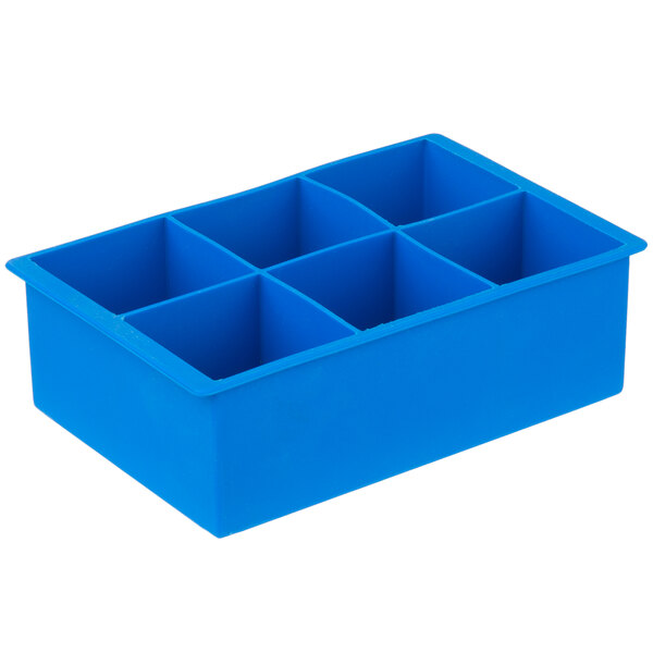 A blue silicone rectangular container with six cube-shaped compartments.