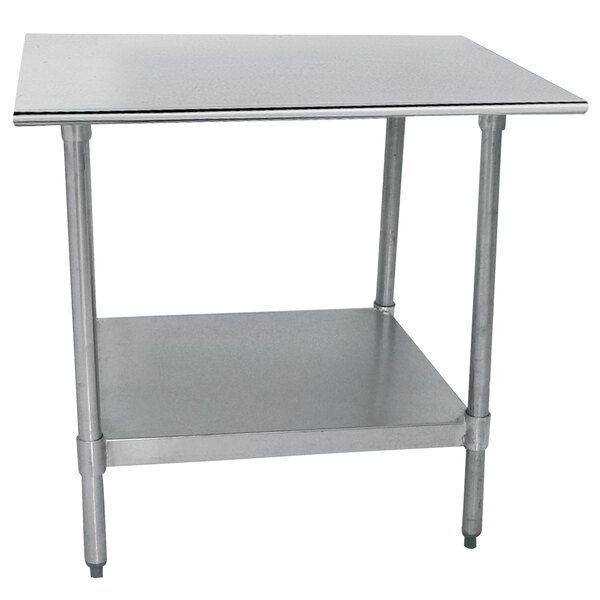 An Advance Tabco stainless steel work table with undershelf.