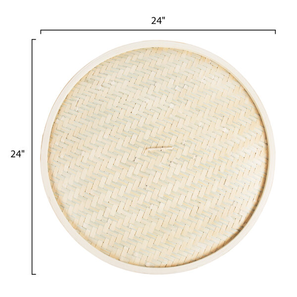 A close up of a round bamboo steamer cover.