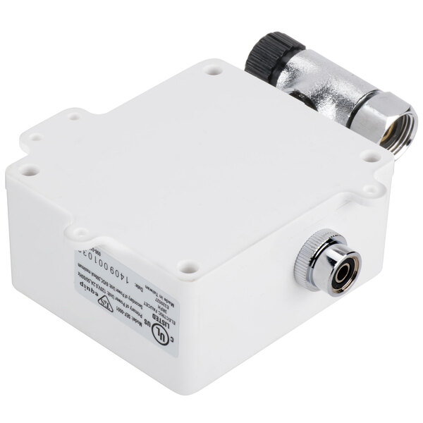 A white box with a silver and black Equip by T&S wall mounted faucet and a couple of connectors.