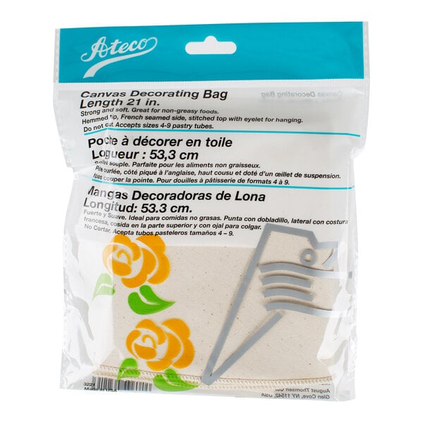 A packaged canvas decorating bag with floral designs and multilingual labeling, partially visible through clear plastic packaging.