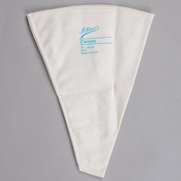 A white triangular canvas bag with blue text.