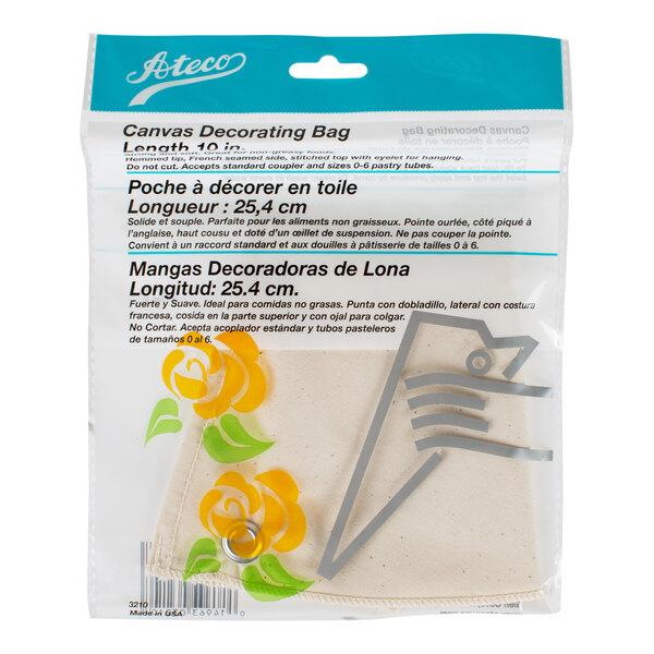 A packaged canvas decorating bag with yellow flower designs and multilingual text on the front.