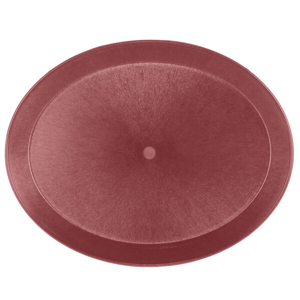 a red plate with a round center