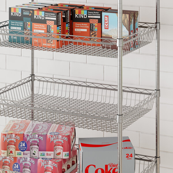 A Regency chrome shelf with boxes and cans on it.