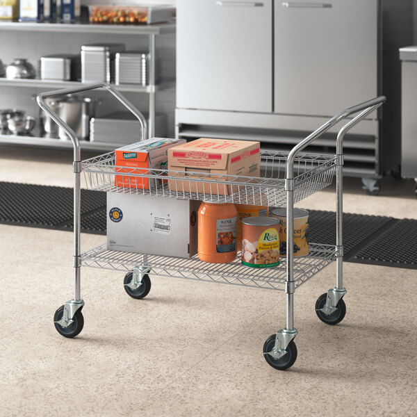 A Regency chrome utility cart with a shelf and basket holding boxes.