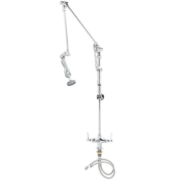 A silver T&S pre-rinse faucet spray valve with a hose.