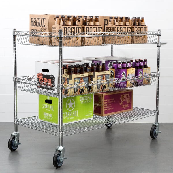 Metal utility cart with three wire shelves and casters