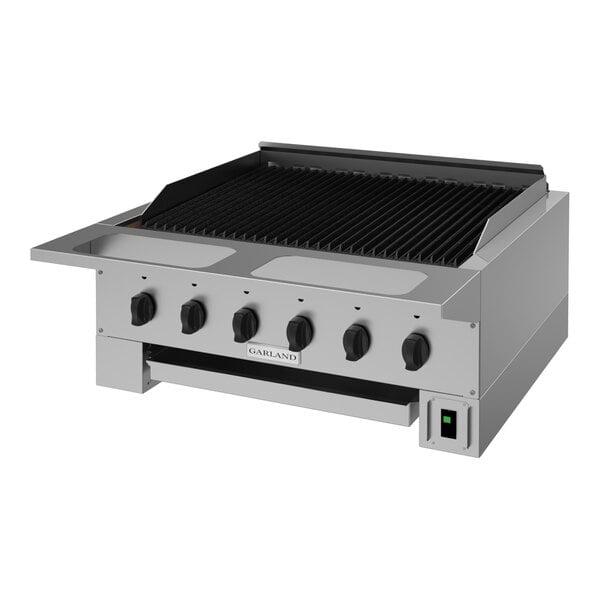 A stainless steel 36-inch natural gas radiant charbroiler with five control knobs and a grill surface.