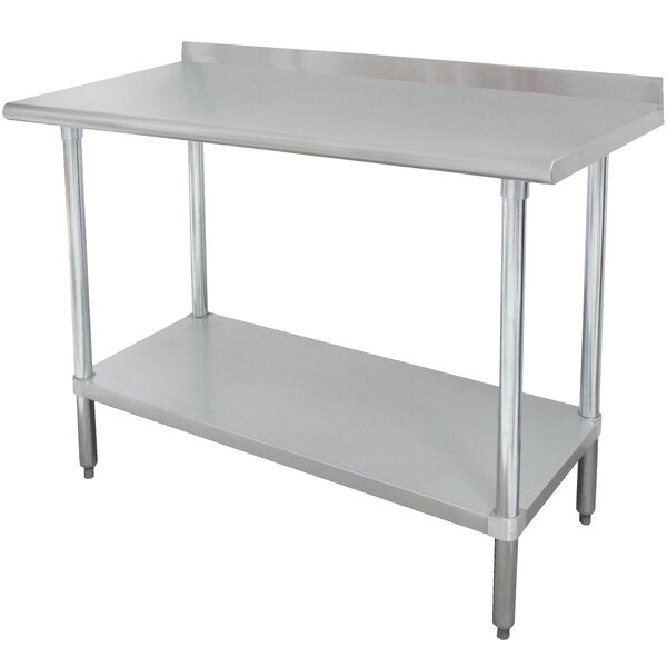 A stainless steel Advance Tabco work table with undershelf.