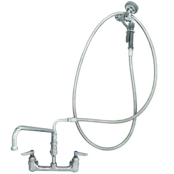 A T&S wall mounted pre-rinse faucet with a hose and lever handles.