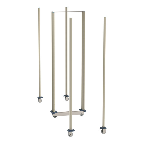 A group of metal objects on wheels with metal poles.