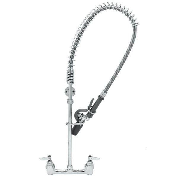 A chrome T&S wall mounted pre-rinse faucet with a curved hose.