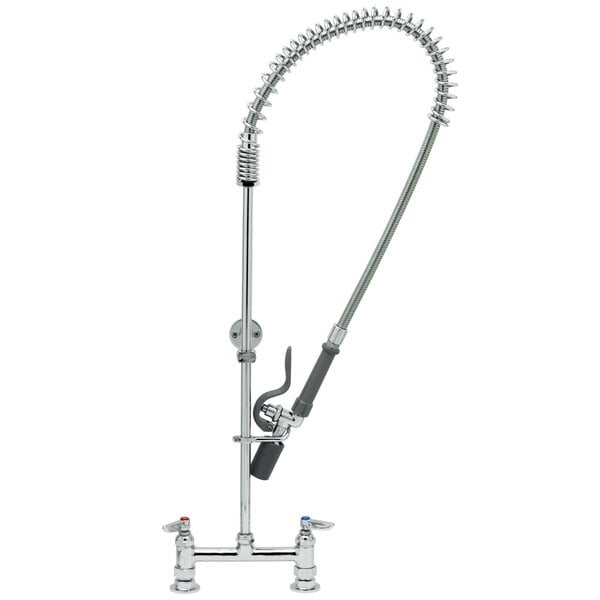 A chrome T&S pre-rinse faucet with a hose and sprayer.