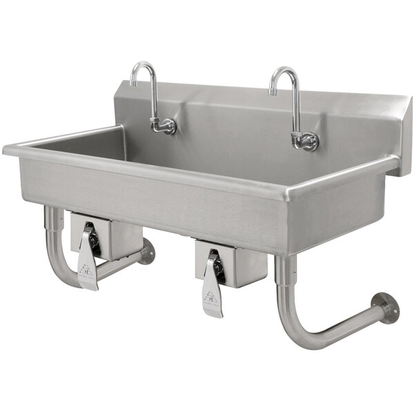 A stainless steel Advance Tabco multi-station hand sink with knee operated faucets.