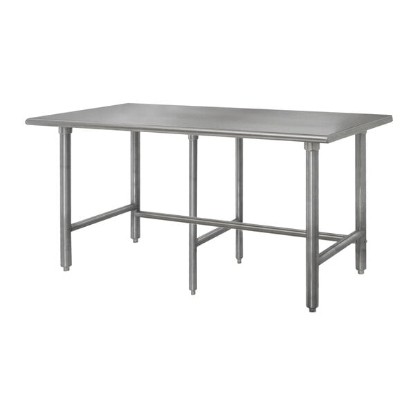 An Advance Tabco stainless steel work table with galvanized legs.