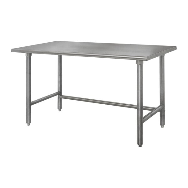 An Advance Tabco stainless steel work table with galvanized legs.