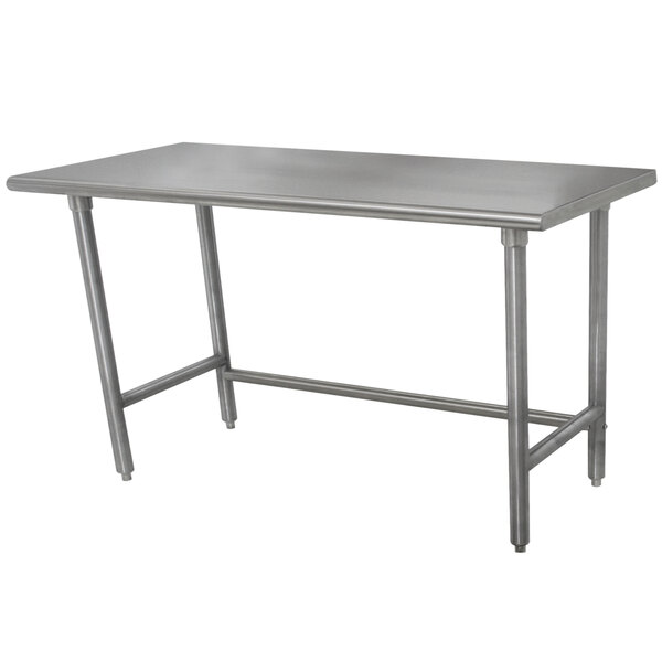 An Advance Tabco stainless steel work table with an open base.