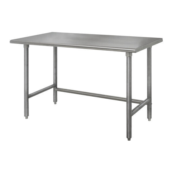 An Advance Tabco stainless steel work table with galvanized legs.
