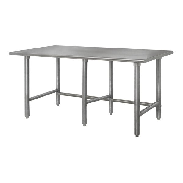 An Advance Tabco stainless steel work table with a rectangular top and galvanized legs.