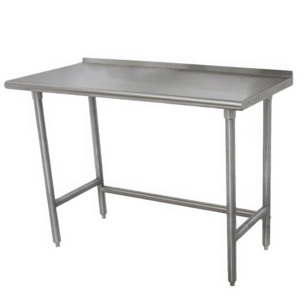 An Advance Tabco stainless steel work table with galvanized legs.